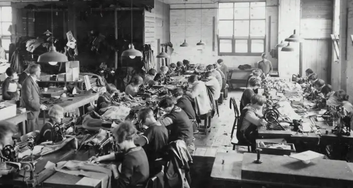 photo of woman working in a sewing factory